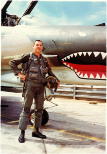 Ted Labernik standing proudly by his fighter jet.